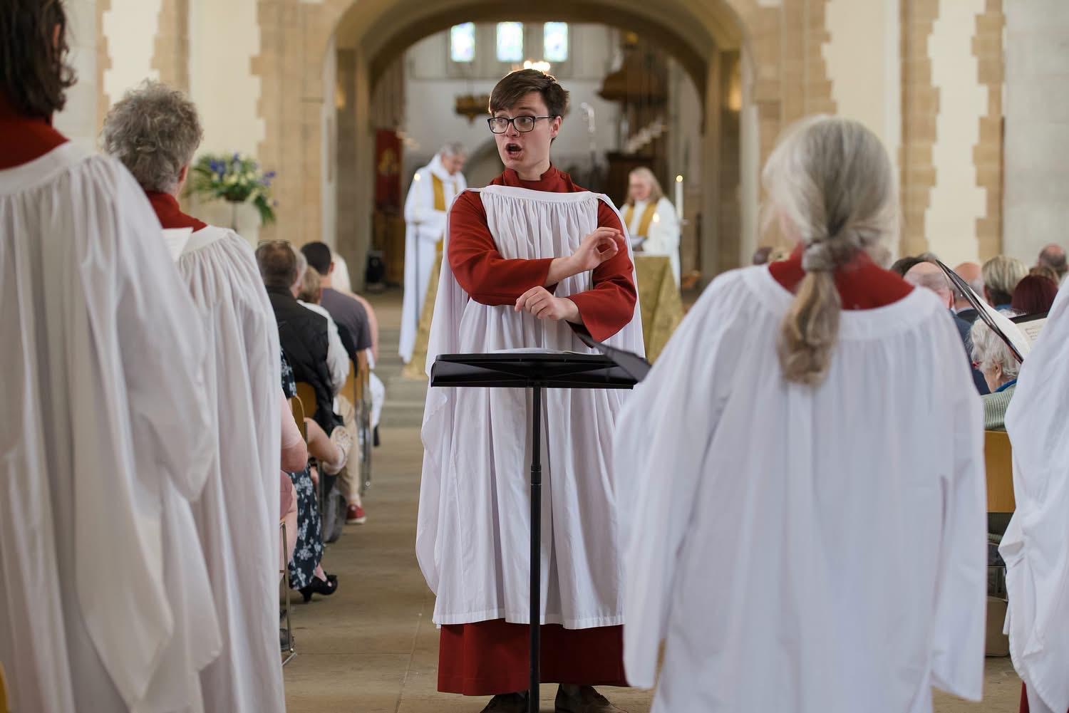 Michael Chamberlain conducting a choir
